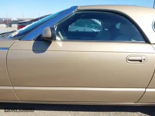 2005 Ford Thunderbird Deluxe with VIN 1FAHP60A45Y100899, listed as a IAAI auction lot 41803706 with 75,319 mi miles. Bid and sale history available at carsss.com. Image 15.