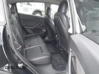2022 Tesla Model Y Long Range z VIN 7SAYGDEE0NF508958, wystawiony jako IAAI lot #42191819 z przebiegiem 60 880 mil mil oraz . Historia ofert i sprzedaży dostępna na DreamBid. Obrazek 8.