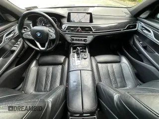 2017 BMW 7 Series ALPINA B7 xDrive z VIN WBA7F2C5XHG422275, wystawiony jako Copart lot #58860745 z przebiegiem 78 093 mil mil oraz Szkody całkowita. Historia ofert i sprzedaży dostępna na DreamBid. Obrazek 9.