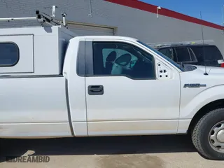 2014 Ford F-150 XL with VIN 1FTMF1CM4EKG22844, listed as a IAAI auction lot 41669259 with 242,141 mi miles. Bid and sale history available at carsss.com. Image 12.