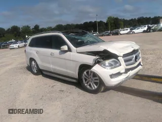2014 Mercedes-Benz GL 450 z VIN 4JGDF7CE2EA287810, wystawiony jako IAAI lot #39696896 z przebiegiem 181 816 mil mil oraz . Historia ofert i sprzedaży dostępna na DreamBid. Obrazek 1.