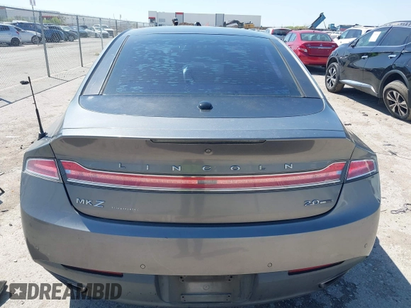 2014 Lincoln MKZ z VIN 3LN6L2G92ER835456, wystawiony jako IAAI lot #41985573 z przebiegiem 174 080 mil mil oraz . Historia ofert i sprzedaży dostępna na DreamBid. Obrazek 16.