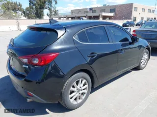 2016 Mazda Mazda3 i Grand Touring with VIN JM1BM1N74G1346467, listed as a IAAI auction lot 41954189 with 85,616 mi miles. Bid and sale history available at carsss.com. Image 4.