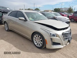 2014 Cadillac CTS Luxury RWD with VIN 1G6AR5SX6E0132580, listed as a IAAI auction lot 41349654 with 113,157 mi miles. Bid and sale history available at carsss.com. Image 1.