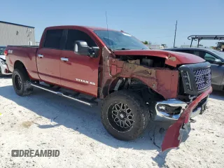 2017 Nissan Titan XD PRO-4X with VIN 1N6BA1F48HN516608, listed as a Copart auction lot 51453465 with 100,767 mi miles and Salvage Title. Bid and sale history available at carsss.com. Image 4.