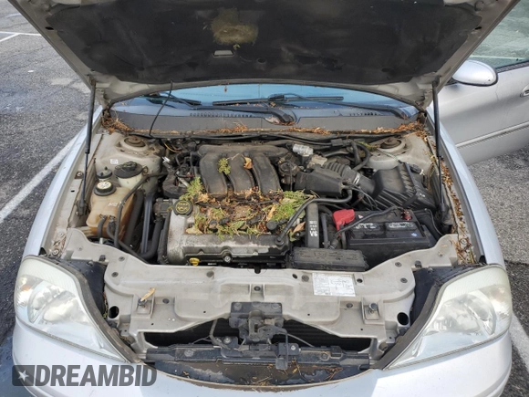 2004 Mercury Sable LS Premium with VIN 1MEHM59S04A608320, listed as a Copart auction lot 43750925 with 93,473 mi miles and Salvage Title. Bid and sale history available at DreamBid. Image 12.