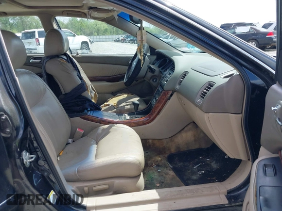 2003 Acura TL with VIN 19UUA56673A044794, listed as a IAAI auction lot 41942065 with 105,837 mi miles. Bid and sale history available at carsss.com. Image 5.
