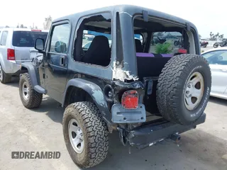 2002 Jeep Wrangler X with VIN 1J4FA39S32P738246, listed as a IAAI auction lot 42106359 with 266,993 mi miles and . Bid and sale history available at DreamBid. Image 3.