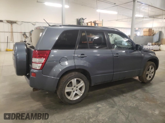 2007 Suzuki Grand Vitara Luxury z VIN JS3TD947774200407, wystawiony jako Copart lot #52001965 z przebiegiem Nie podano mil oraz Szkoda całkowita • Salvage title. Historia ofert i sprzedaży dostępna na DreamBid. Obrazek 3.