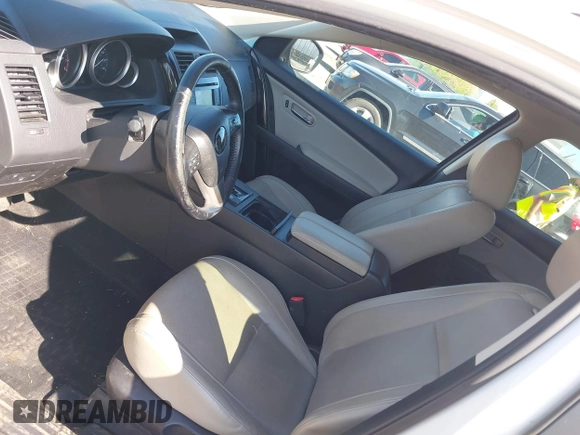 2015 Mazda CX-9 Touring with VIN JM3TB3CV1F0461403, listed as a IAAI auction lot 42148325 with 143,452 mi miles. Bid and sale history available at carsss.com. Image 18.