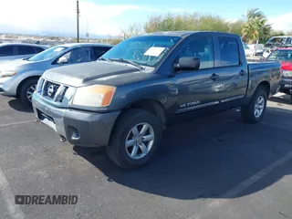 2010 Nissan Titan XE with VIN 1N6BA0EJ5AN304045, listed as a IAAI auction lot 41794718 with 297,551 mi miles. Bid and sale history available at carsss.com. Image 20.