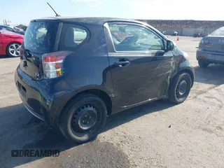 2013 Scion iQ with VIN JTNJJXB04DJ024322, listed as a IAAI auction lot 42618525 with 154,559 mi miles and . Bid and sale history available at DreamBid. Image 4.