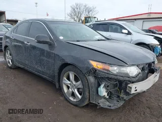 2009 Acura TSX with VIN JH4CU26669C019140, listed as a IAAI auction lot 41633824 with 174,997 mi miles. Bid and sale history available at carsss.com. Image 1.