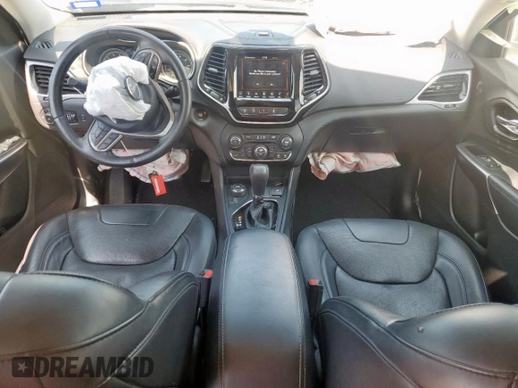 2019 Jeep Cherokee High Altitude with VIN 1C4PJMDX7KD260644, listed as a Copart auction lot 60416985 with 60,861 mi miles and Salvage title. Bid and sale history available at DreamBid. Image 8.