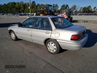 1995 Ford Escort z VIN 3FASP13J0SR159107, wystawiony jako Copart lot #76715394 z przebiegiem 353 430 mil mil oraz Szkody całkowita. Historia ofert i sprzedaży dostępna na DreamBid. Obrazek 2.