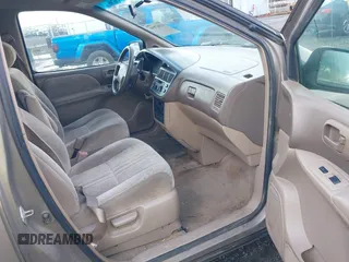 1998 Toyota Sienna LE with VIN 4T3ZF13C8WU021653, listed as a IAAI auction lot 41947958 with 304,852 mi miles. Bid and sale history available at carsss.com. Image 5.