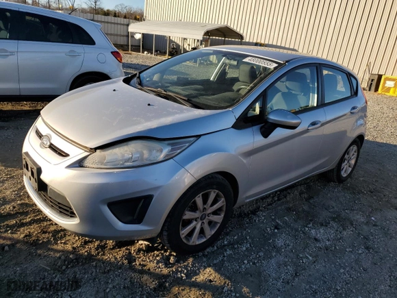 2012 Ford Fiesta SE with VIN 3FADP4EJ3CM194231, listed as a Copart auction lot 48000555 with 142,666 mi miles and Salvage Title. Bid and sale history available at carsss.com. Image 1.