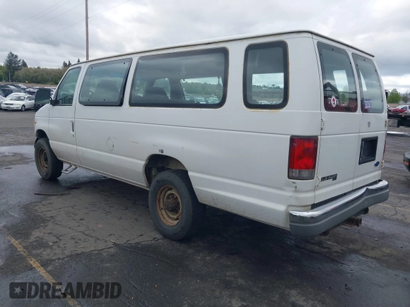 1997 Ford Econoline Wagon XL z VIN 1FBJS31L3VHB66356, wystawiony jako IAAI lot #39189974 z przebiegiem 242 944 mil mil oraz . Historia ofert i sprzedaży dostępna na DreamBid. Obrazek 3.
