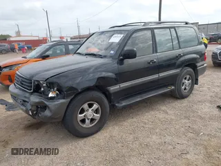 2001 Toyota Land Cruiser z VIN JTEHT05J812001099, wystawiony jako IAAI lot #42057630 z przebiegiem Nie podano mil oraz . Historia ofert i sprzedaży dostępna na DreamBid. Obrazek 2.