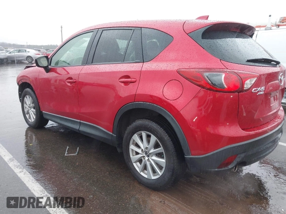 2015 Mazda CX-5 Touring with VIN JM3KE4CY3F0529669, listed as a IAAI auction lot 41866873 with 137,635 mi miles and . Bid and sale history available at carsss.com. Image 3.