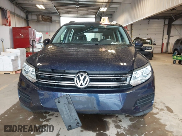 2016 Volkswagen Tiguan S with VIN WVGBV7AXXGW565289, listed as a IAAI auction lot 42113317 with 83,537 mi miles and . Bid and sale history available at DreamBid. Image 12.