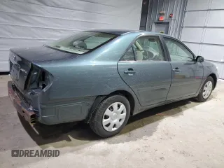 2004 Toyota Camry LE z VIN 4T1BE32K74U311882, wystawiony jako Copart lot #47997235 z przebiegiem 205 299 mil mil oraz Szkoda całkowita • Salvage title. Historia ofert i sprzedaży dostępna na DreamBid. Obrazek 3.
