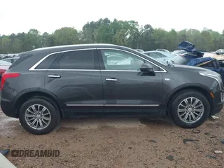 2019 Cadillac XT5 Luxury AWD z VIN 1GYKNDRS6KZ113420, wystawiony jako IAAI lot #41951065 z przebiegiem 56 360 mil mil oraz . Historia ofert i sprzedaży dostępna na DreamBid. Obrazek 14.