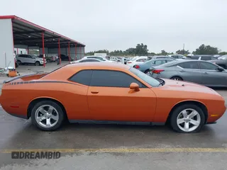 2011 Dodge Challenger z VIN 2B3CJ4DG9BH602419, wystawiony jako IAAI lot #40753257 z przebiegiem 124 282 mil mil oraz . Historia ofert i sprzedaży dostępna na DreamBid. Obrazek 13.