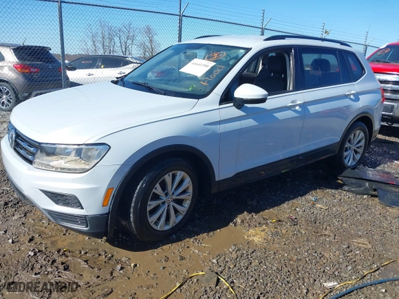 2018 Volkswagen Tiguan S with VIN 3VV1B7AX2JM066312, listed as a IAAI auction lot 41641390 with 133,000 mi miles. Bid and sale history available at carsss.com. Image 2.