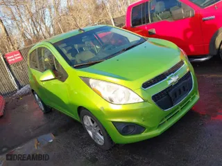 2014 Chevrolet Spark LS with VIN KL8CB6S97EC497603, listed as a IAAI auction lot 41411792 with 72,792 mi miles. Bid and sale history available at carsss.com. Image 1.