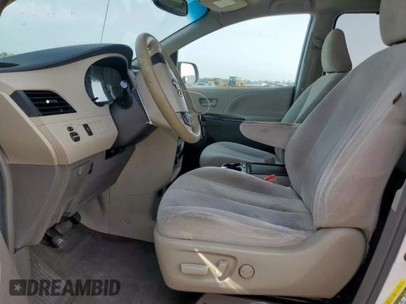 2014 Toyota Sienna LE AAS with VIN 5TDKK3DC0ES433847, listed as a Copart auction lot 63260025 with 160,130 mi miles and Salvage title. Bid and sale history available at DreamBid. Image 7.