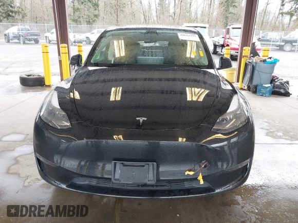 2023 Tesla Model Y Long Range with VIN 7SAYGAEE7PF739924, listed as a IAAI auction lot 41612323 with 75,226 mi miles and . Bid and sale history available at DreamBid. Image 11.