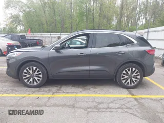2020 Ford Escape Titanium with VIN 1FMCU9J96LUA00564, listed as a IAAI auction lot 42261152 with 73,748 mi miles and . Bid and sale history available at DreamBid. Image 14.