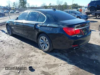 2011 BMW 7 Series 740i with VIN WBAKA4C58BC392020, listed as a IAAI auction lot 41314751 with 116,553 mi miles. Bid and sale history available at carsss.com. Image 3.