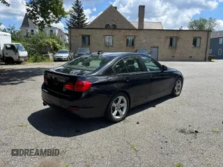 2013 BMW 3 Series 328i xDrive with VIN WBA3B5G57DNS00448, listed as a Copart auction lot 63165005 with 190,464 mi miles and Clean title. Bid and sale history available at DreamBid. Image 4.