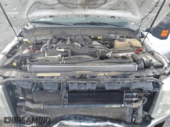 2012 Ford F-350 z VIN 1FT8W3AT7CEB99521, wystawiony jako Copart lot #65911194 z przebiegiem 164 339 mil mil oraz Szkoda całkowita • Salvage title. Historia ofert i sprzedaży dostępna na DreamBid. Obrazek 11.