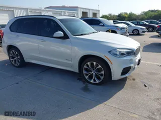 2014 BMW X5 xDrive50i with VIN 5UXKR6C58E0J73067, listed as a IAAI auction lot 41857522 with 111,340 mi miles. Bid and sale history available at carsss.com. Image 1.