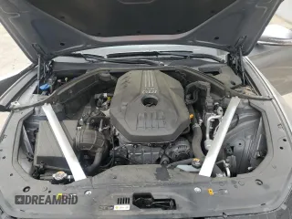 2023 Genesis G70 2.0T with VIN KMTG34TA0PU123657, listed as a Copart auction lot 72560954 with 26,678 mi miles and Salvage Title. Bid and sale history available at carsss.com. Image 11.