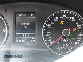 2014 Volkswagen Passat TDI SEL Premium with VIN 1VWCN7A33EC068280, listed as a IAAI auction lot 42086420 with 153,656 mi miles. Bid and sale history available at carsss.com. Image 7.