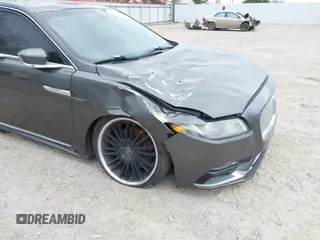 2018 Lincoln Continental Premiere z VIN 1LN6L9PK3J5603389, wystawiony jako IAAI lot #41691647 z przebiegiem 72 139 mil mil oraz . Historia ofert i sprzedaży dostępna na DreamBid. Obrazek 6.