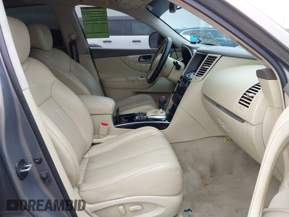 2014 Infiniti QX70 z VIN JN8CS1MU3EM451745, wystawiony jako IAAI lot #42203922 z przebiegiem 144 990 mil mil oraz . Historia ofert i sprzedaży dostępna na DreamBid. Obrazek 5.