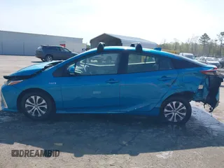 2021 Toyota Prius LE with VIN JTDKAMFP7M3180504, listed as a IAAI auction lot 41985409 with 56,617 mi miles and . Bid and sale history available at DreamBid. Image 14.
