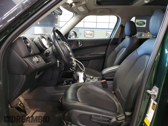 2018 MINI Countryman Cooper with VIN WMZYV5C38J3E03914, listed as a Copart auction lot 87455344 with 86,706 mi miles and Salvage Title. Bid and sale history available at carsss.com. Image 7.