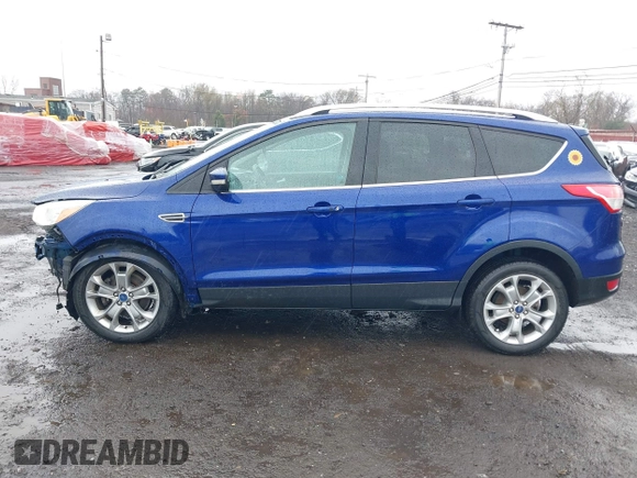 2014 Ford Escape Titanium with VIN 1FMCU9J99EUA46103, listed as a IAAI auction lot 42018097 with 169,878 mi miles and . Bid and sale history available at DreamBid. Image 14.