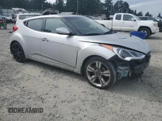 2012 Hyundai Veloster w/Black Int с VIN KMHTC6AD2CU063070, выставлен на аукционе Copart как лот 60391315 с пробегом 153 745 миль миль и Списание • Salvage title. История ставок и продаж доступна на DreamBid. Изображение 4.