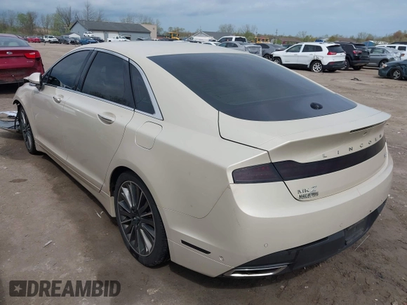 2014 Lincoln MKZ z VIN 3LN6L2JK7ER821385, wystawiony jako IAAI lot #42114154 z przebiegiem 141 480 mil mil oraz . Historia ofert i sprzedaży dostępna na DreamBid. Obrazek 3.