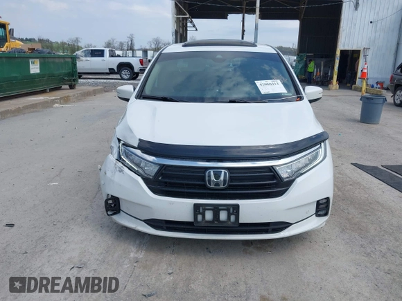 2021 Honda Odyssey Touring with VIN 5FNRL6H80MB010952, listed as a IAAI auction lot 42080412 with 90,594 mi miles and . Bid and sale history available at DreamBid. Image 12.