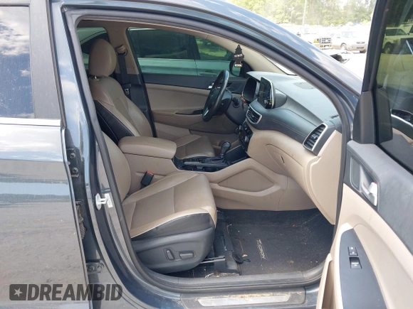 2019 Hyundai Tucson Sport z VIN KM8J33AL2KU909919, wystawiony jako IAAI lot #42055525 z przebiegiem 109 985 mil mil oraz . Historia ofert i sprzedaży dostępna na DreamBid. Obrazek 5.