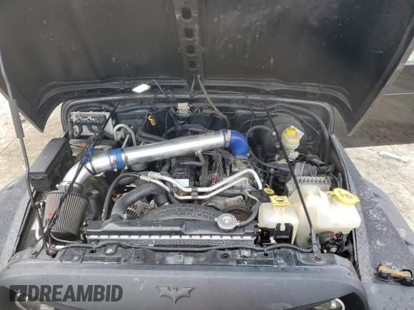 2004 Jeep Wrangler Sahara with VIN 1J4FA59SX4P722608, listed as a Copart auction lot 51223345 with 146,600 mi miles and Salvage title. Bid and sale history available at DreamBid. Image 11.