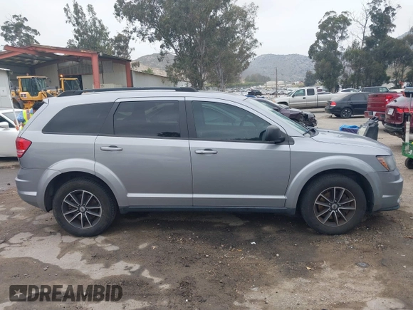 2018 Dodge Journey SE with VIN 3C4PDCAB1JT141295, listed as a IAAI auction lot 42098218 with 110,691 mi miles. Bid and sale history available at carsss.com. Image 13.